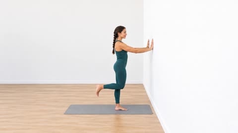 Flexión de rodilla con apoyo en la pared